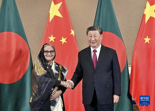 习近平会见孟加拉国总理哈西娜1_缩小大小.jpg